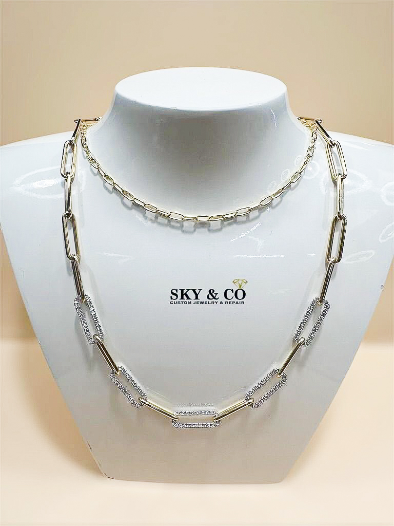 Layered gold and diamond link necklaces